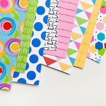 Load image into Gallery viewer, Catherine Pooler - Patterned Paper - Sketchbook. Vibrant colors and funky geometric patterns make up our Sketchbook Patterned Paper. Inspired by doodles in your sketchbook, this pack is full of texture, shape and abstract designs. The color combo of It&#39;s a Girl, Be Mine, Rockin&#39; Red, Catching Rays, Tiara, Lime Rickey, Cummerbund, Fiesta Blue, and Something Borrowed is bright and cheerful. Don&#39;t forget the Scranton Sequin Mix! Available at Embellish Away located in Bowmanville Ontario Canada.

