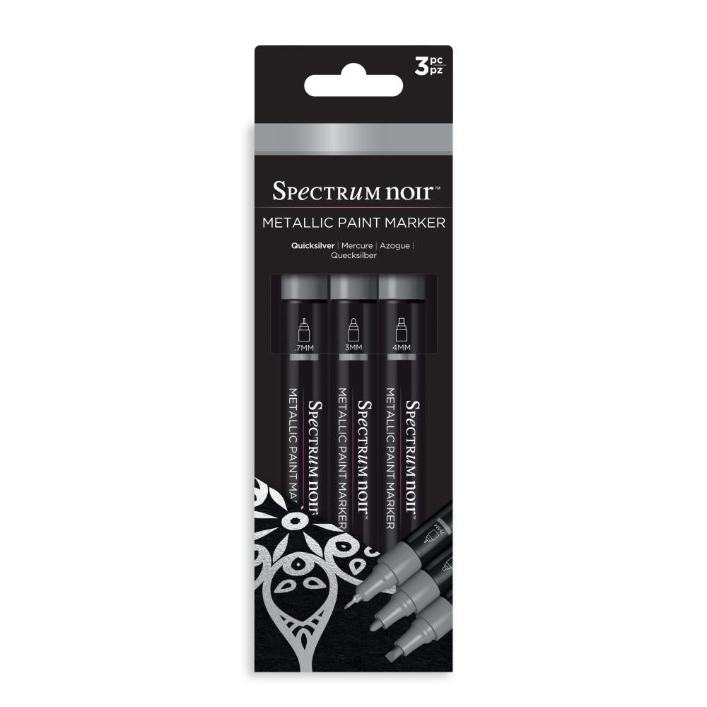 Spectrum Noir - Metallic Paint Marker - 3/Pkg - Quick Silver. A new line of intense, high-shine opaque metallic markers in gold silver and copper. Use on paper, card, canvas, wood, metal, plastic, glass, ceramic and most surfaces. Each set includes: 3 Markers, 1 colour. With a .7MM Superfine Tip, 3MM Fine Tip AND 4 MM Chisel Tip for a huge range of applications. Available at Embellish Away located in Bowmanville Ontario Canada.