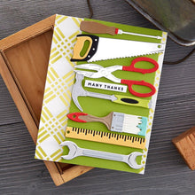Load image into Gallery viewer, Spellbinders - Etched Dies By Nancy McCabe - Toolbox Essentials - All The Tools. This set includes 25 thin metal cutting dies. It indeed has all the tools from a hammer to a saw and even a ruler! Available at Embellish Away located in Bowmanville Ontario Canada. Example by brand ambassador.
