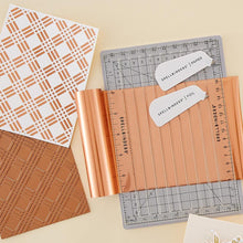 Load image into Gallery viewer, Spellbinders - Glimmer Foil Roll - Satin Rose Gold. Glimmer hots add stunning and eye-catching foil designs to any project from paper crafts to mixed media and more! The foils are exclusively designed to be used with the Spellbinders Glimmer Hot Foil System. Available at Embellish Away located in Bowmanville Ontario Canada.
