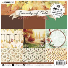Load image into Gallery viewer, Studio Light - Paper Pad - Pattern Paper - Beauty Of Fall - 150x150mm - 36 Sheets - nr.13. A beautiful Fall themed paper pad of 170gsm heavyweight acid free cardstock includes 36 sheets with 9 patterns. Perfect for invitations, scrapbooks, cards, and party decorations. The Beauty of Fall collection has all kinds of elements to make all the fall sceneries you want. Size: 6 x 6 inches. Available at Embellish Away located in Bowmanville Ontario Canada.

