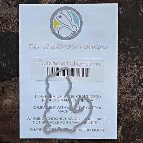 The Rabbit Hole Designs - Die Set - Chameleon. The Rabbit Hole Designs dies are made of durable 100% steel Usable in nearly every machine on the market! Use on cardstock, felt, fabric or shrink plastic. You can use wafer thin dies to cut, stencil, emboss and create! Made in the USA.  Coordinates with the Chameleon 3x4 Stamp Set. Available at Embellish Away located in Bowmanville Ontario Canada.