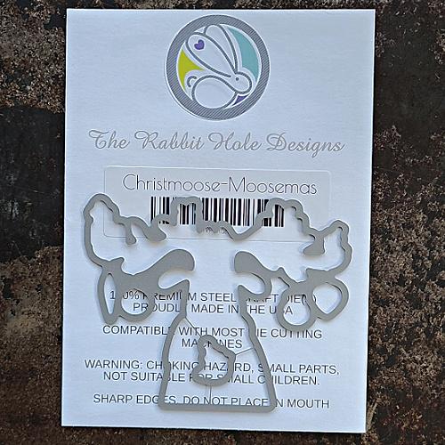 The Rabbit Hole Designs - Die Set - Christmoose - Moosemas. The Rabbit Hole Designs dies are made of durable 100% steel Usable in nearly every machine on the market! Use on cardstock, felt, fabric or shrink plastic. You can use wafer thin dies to cut, stencil, emboss and create! Made in the USA.  Coordinates with Christmoose - Moosemas Stamp Set. Available at Embellish Away located in Bowmanville Ontario Canada.