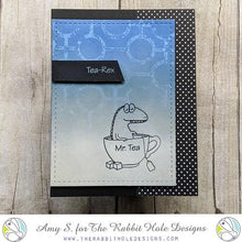 Load image into Gallery viewer, The Rabbit Hole Designs - Stamp Set - Caffeinated - Tea-Rex - 2x3. Deeply etched, clear photopolymer stamps for precise placement. Made in the USA. Available at embellish Away located in Bowmanville Ontario Canada. Card design by Amy S.
