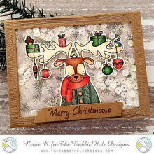 Load image into Gallery viewer, The Rabbit Hole Designs - Stamp Set - Christmoose - Moosemas. Deeply etched, clear photopolymer stamps for precise placement. Made in the USA. Approx. size 4x6.  Coordinates with our Christmoose - Moosemas Dies. Available at Embellish Away located in Bowmanville Ontario Canada. Card example by Renee E.
