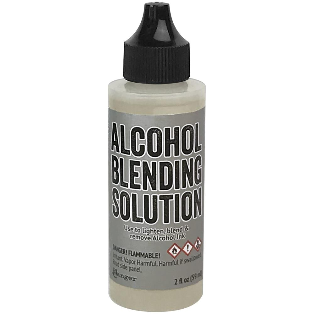 Tim Holtz - Alcohol Ink Blending Solution - 2oz - Uncarded. Alcohol blending solution is specially formulated to blend, lighten and remove Tim Holtz® Alcohol Inks. A solvent based solution designed to remove Alcohol Inks and Mixatives from slick surfaces and art tools. Available at Embellish Away located in Bowmanville Ontario Canada.