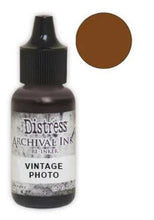 Load image into Gallery viewer, Tim Holtz® Re-Inkers can be used to re-ink Distress Archival Ink Pads, which are sold separately. They are Acid Free, Non-Toxic and Fade Resistant. Package contains one Tim Holtz® Distress® Archival Re-Inker, 0.5 ounces. Available in assorted colors, each sold separately. Made in the USA. Available at Embellish Away located in Bowmanville Ontario Canada. Vintage Photo
