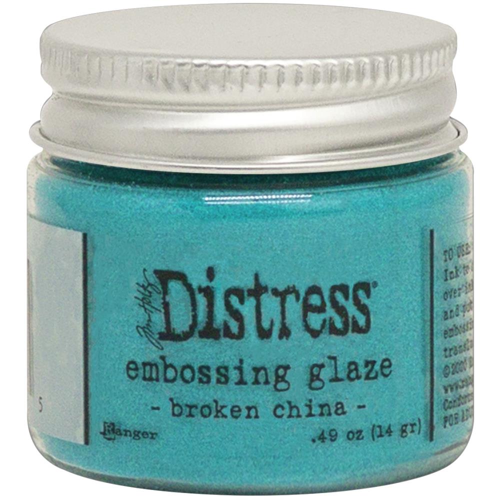 Tim Holtz - Distress Embossing Glaze - Broken China. Add dimension to your projects with new embossing glaze! These translucent embossing powders are ideal for layering on surfaces. This package contains .49oz of embossing glaze. Available at Embellish Away located in Bowmanville Ontario Canada.