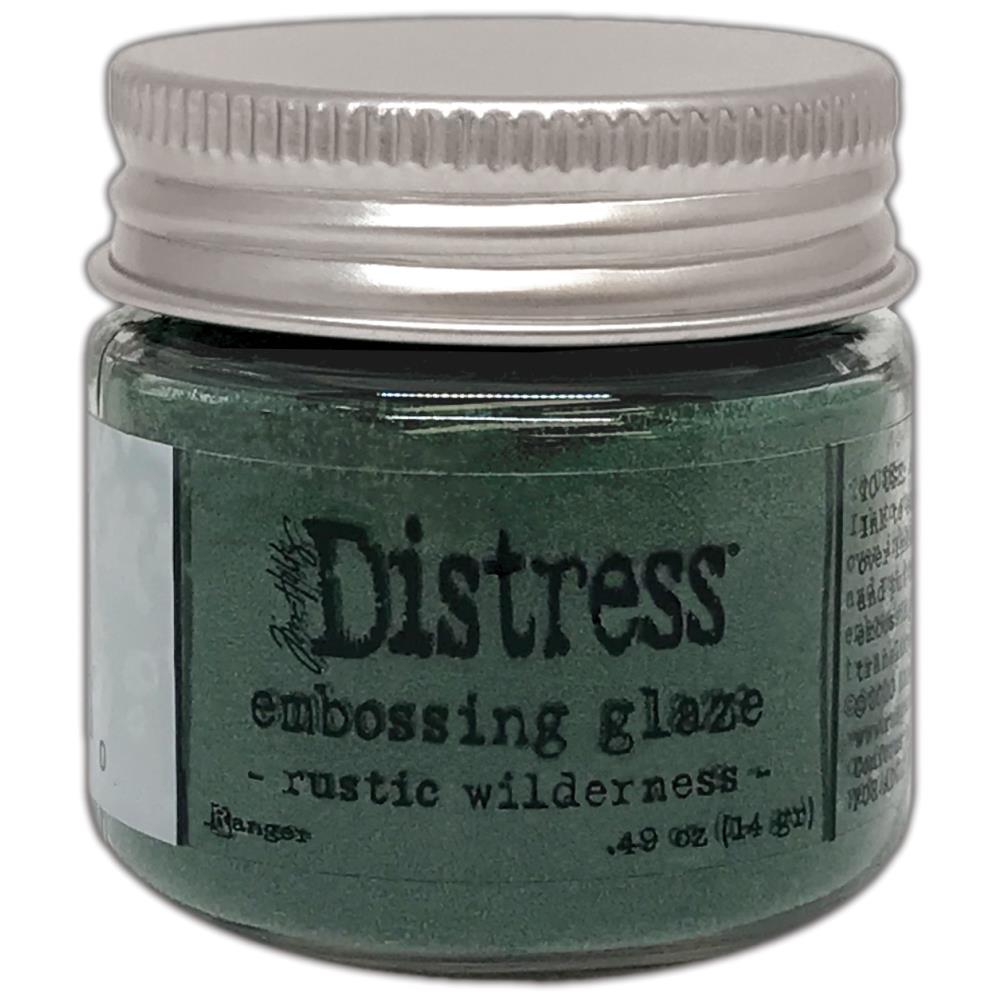 Tim Holtz - Distress Embossing Glaze - Rustic Wilderness. Add dimension to your projects with new embossing glaze! These translucent embossing powders are ideal for layering on surfaces. This package contains .49oz of embossing glaze. Conforms to ASTM D 4236. Comes in a variety of colors. Each sold separately. Made in USA. Available at Embellish Away located in Bowmanville Ontario Canada.