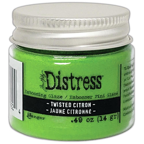 Tim Holtz - Distress Embossing Glaze - Twisted Citron. Add dimension to your projects with new embossing glaze! These translucent embossing powders are ideal for layering on surfaces. This package contains .49oz of embossing glaze. Conforms to ASTM D 4236. Comes in a variety of colors. Each sold separately. Made in USA. Available at Embellish Away located in Bowmanville Ontario Canada.
