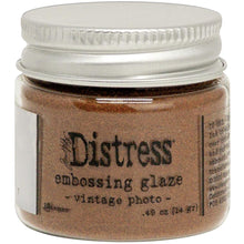 Charger l&#39;image dans la galerie, Tim Holtz - Distress Embossing Glaze - Vintage Photo. Add dimension to your projects with new embossing glaze! These translucent embossing powders are ideal for layering on surfaces. This package contains .49oz of embossing glaze. Conforms to ASTM D 4236. Comes in a variety of colors. Each sold separately. Made in USA. Available at Embellish Away located in Bowmanville Ontario Canada.
