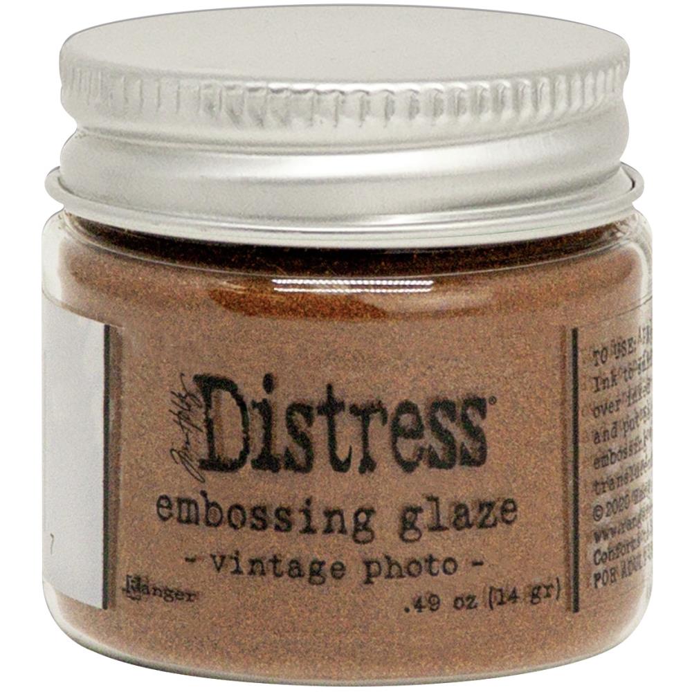 Tim Holtz - Distress Embossing Glaze - Vintage Photo. Add dimension to your projects with new embossing glaze! These translucent embossing powders are ideal for layering on surfaces. This package contains .49oz of embossing glaze. Conforms to ASTM D 4236. Comes in a variety of colors. Each sold separately. Made in USA. Available at Embellish Away located in Bowmanville Ontario Canada.