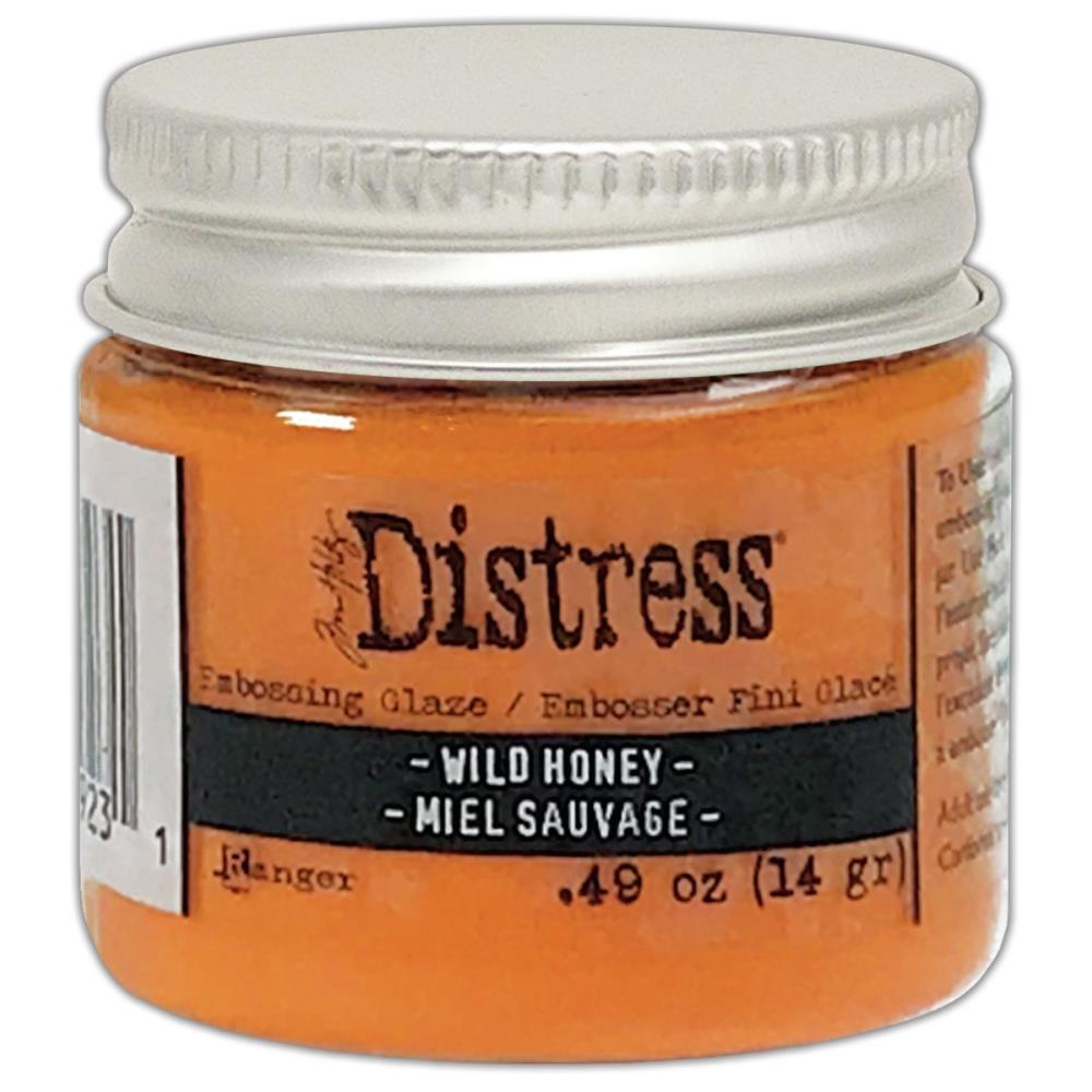Tim Holtz - Distress Embossing Glaze - Wild Honey. Add dimension to your projects with new embossing glaze! These translucent embossing powders are ideal for layering on surfaces. This package contains .49oz of embossing glaze. Conforms to ASTM D 4236. Comes in a variety of colors. Each sold separately. Made in USA. Available at Embellish Away located in Bowmanville Ontario Canada.