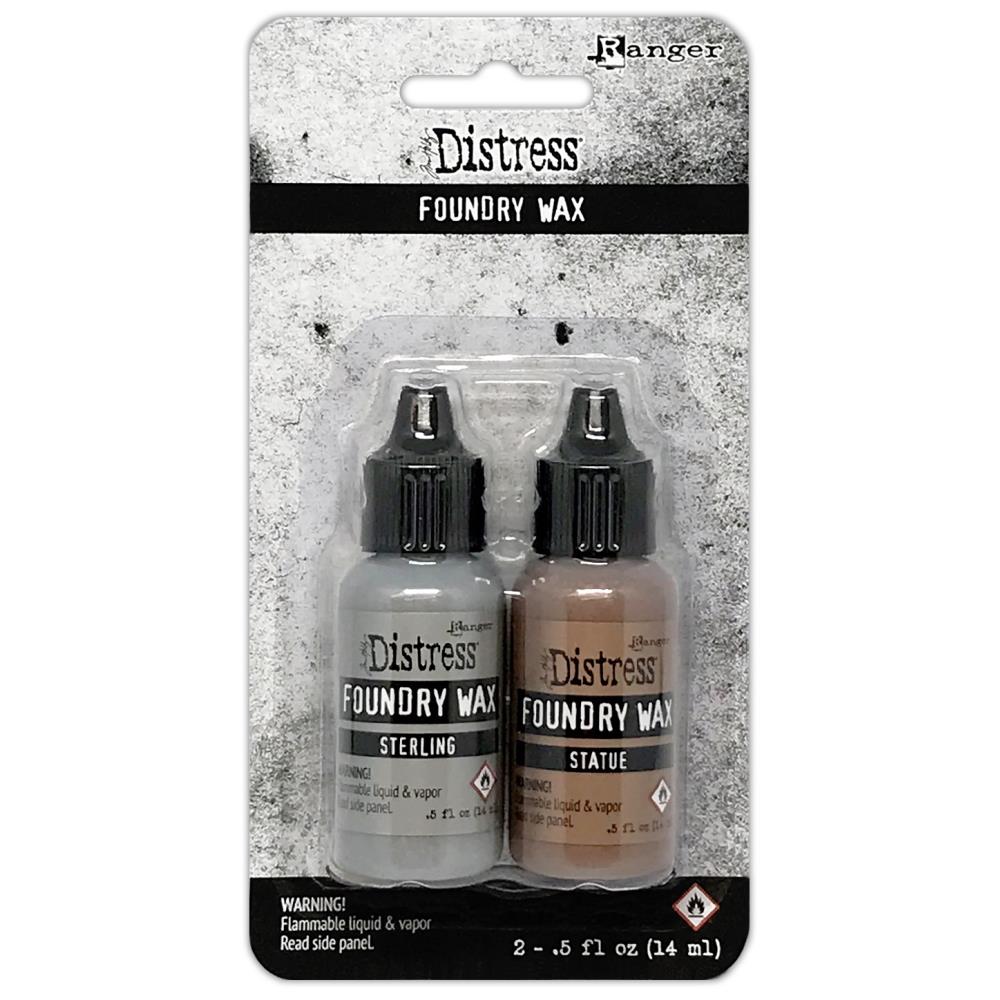 Tim Holtz - Distress Foundry Wax Kit - Sterling/Statue. Distress Foundry Wax is designed to create luminous metallic highlights on porous and non-porous surfaces. The fluid wax transforms into a vibrant metallic finish once heat is applied. Available at Embellish Away located in Bowmanville Ontario Canada.