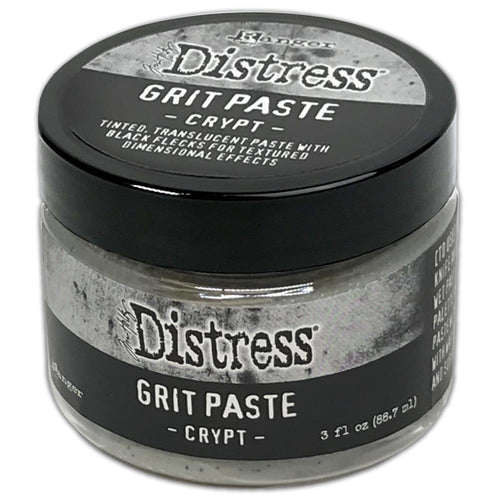 Tim Holtz - Distress Grit Paste - 3oz - Crypt. Add a touch of textured goodness to your Halloween creations! This granite tinted, translucent medium with flecks of black is designed to create textured effects on surfaces. Available at Embellish Away located in Bowmanville Ontario Canada.