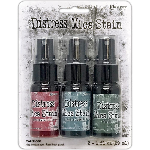 Tim Holtz - Distress Mica Stain Set - Holiday Set# 1.  This set includes 3 Holiday colours: Peppermint Stick, Frosted Juniper, Tree Lot. Limited supplies release. Available at Embellish Away located in Bowmanville Ontario Canada.