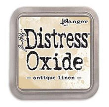 Load image into Gallery viewer, Tim Holtz - Distress Oxide Pad - Large. Create an aged look on papers, fibers, photos and more! This package contains one 2-1/4x2-1/4 inch ink pad. Comes in a variety of distressed colors. Each sold separately. Available at Embellish Away located in Bowmanville Ontario Canada. Antique Linen.
