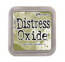 Load image into Gallery viewer, Tim Holtz - Distress Oxide Pad - Large. Create an aged look on papers, fibers, photos and more! This package contains one 2-1/4x2-1/4 inch ink pad. Comes in a variety of distressed colors. Each sold separately. Available at Embellish Away located in Bowmanville Ontario Canada. Peeled Paint.
