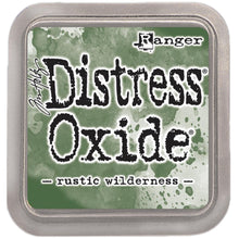 Load image into Gallery viewer, Tim Holtz - Distress Oxide Pad - Large. Create an aged look on papers, fibers, photos and more! This package contains one 2-1/4x2-1/4 inch ink pad. Comes in a variety of distressed colors. Each sold separately. Available at Embellish Away located in Bowmanville Ontario Canada. Rustic Wilderness
