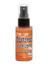 गैलरी व्यूवर में इमेज लोड करें, Tim Holtz - Distress Oxide Spray. Creates oxidized effects when sprayed with water. Use for quick and easy ink coverage on porous surfaces. Spray through stencils, layer colors, spritz with water and watch the color mix and blend.  Available at Embellish Away located in Bowmanville Ontario Canada. Carved Pumpkin
