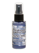 Load image into Gallery viewer, Tim Holtz - Distress Oxide Spray. Creates oxidized effects when sprayed with water. Use for quick and easy ink coverage on porous surfaces. Spray through stencils, layer colors, spritz with water and watch the color mix and blend.  Available at Embellish Away located in Bowmanville Ontario Canada. Chipped Sapphire
