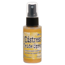 गैलरी व्यूवर में इमेज लोड करें, Tim Holtz - Distress Oxide Spray. Creates oxidized effects when sprayed with water. Use for quick and easy ink coverage on porous surfaces. Spray through stencils, layer colors, spritz with water and watch the color mix and blend.  Available at Embellish Away located in Bowmanville Ontario Canada. Fossilized Amber
