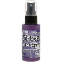 गैलरी व्यूवर में इमेज लोड करें, Tim Holtz - Distress Oxide Spray. Creates oxidized effects when sprayed with water. Use for quick and easy ink coverage on porous surfaces. Spray through stencils, layer colors, spritz with water and watch the color mix and blend.  Available at Embellish Away located in Bowmanville Ontario Canada. Villainous Potion
