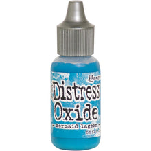 गैलरी व्यूवर में इमेज लोड करें, Tim Holtz-Ranger Distress Oxides Reinkers. This water-reactive dye and pigment ink fusion creates an oxidized effect when sprayed with water. Use to re-ink Distress Oxide Ink Pads (sold separately). Available at Embellish Away located in Bowmanville Ontario Canada. Mermaid Lagoon
