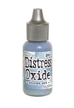 Cargar imagen en el visor de la galería, Tim Holtz-Ranger Distress Oxides Reinkers. This water-reactive dye and pigment ink fusion creates an oxidized effect when sprayed with water. Use to re-ink Distress Oxide Ink Pads (sold separately). Available at Embellish Away located in Bowmanville Ontario Canada. Stormy Sky
