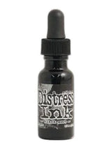 Load image into Gallery viewer, Tim Holtz - Distress  Reinker. Create an aged look on papers, fibers, photos and more! This package contains one 0.5oz bottle of distress ink. Acid free. Conforms to ASTM D4236. Comes in a variety of colors. Each sold separately. Available at Embellish Away located in Bowmanville Ontario. Black Soot
