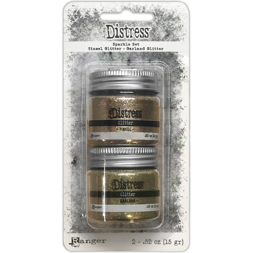 Tim Holtz - Distress Sparkle Set - Holiday. This package includes Glitter Tinsel and Glitter Garland. 2 - .52 oz. Limited supplies release. Available at Embellish Away located in Bowmanville Ontario Canada.