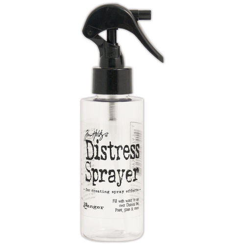 Ranger-Tim Holtz Distress Sprayer. Fill the Distress Sprayer with water to create sprayed effects over distress Ink, Paint, Stain and more! The trigger sprayer is designed for quick, all over coverage. This package contains one 2oz spray bottle. Conforms to ASTM D 4236. Made in USA. Available at Embellish Away located in Bowmanville Ontario Canada.