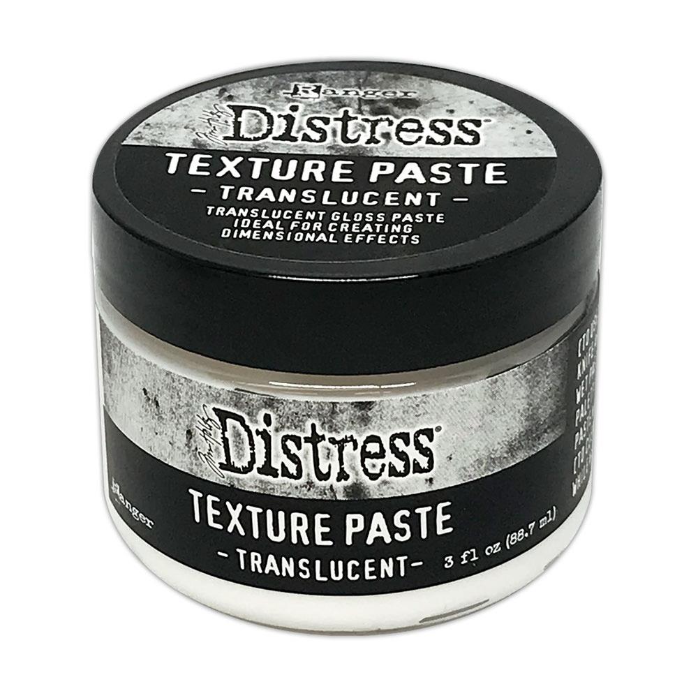 Tim Holtz Distress Texture Paste Translucent is a translucent gloss paste ideal for creating dimensional effects. Texture Paste can be colorized both while wet or once dried to allow for endless color possibilities. Great for use with Tim Holtz Distress Palette Knives. This package contains 3oz of translucent texture paste. Non-toxic. Acid free. Conforms to ASTM D 4236. Made in USA. Available at Embellish Away located in Bowmanville Ontario Canada.