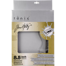 Cargar imagen en el visor de la galería, Tim Holtz - Guillotine Comfort Trimmer 8.5&quot;. Perfect for cutting paper and cardstock! This 13x9-1/2x2- 1/2 inch package contains one paper trimmer that has a measuring grid and can cut up to 8-1/2 inches. Imported. Available at Embellish Away located in Bowmanville Ontario Canada.
