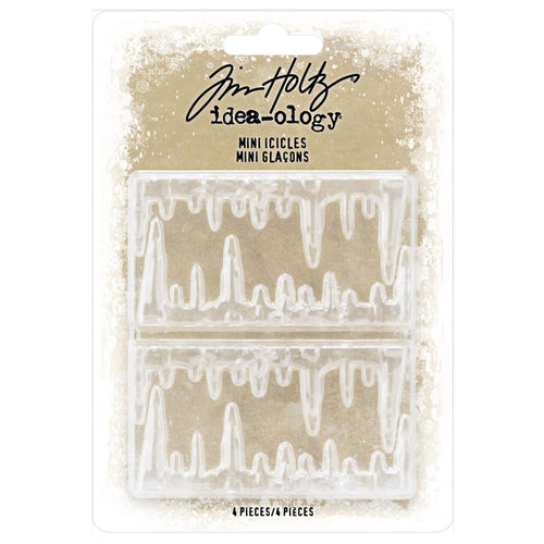 Tim Holtz - Idea-Ology - 4/Pkg - Icicles. These sculpted icicle trims can be sprinkled with white glitter for an icy appearance then added to any handmade holiday project. Icicles measure 2-3/4 inches. Imported. Available at Embellish Away located in Bowmanville Ontario Canada.