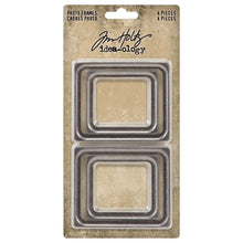 Load image into Gallery viewer, Tim Holtz - Idea-Ology - Metal Photo Frames - 4/Pkg. Add a touch of elegance to your creations with these Frames. These frames are crafted from brushed silver metal, providing a sleek and sophisticated look that is sure to elevate your projects. Available at Embellish Away located in Bowmanville Ontario Canada.
