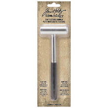 Load image into Gallery viewer, Tim Holtz - Idea-Ology - Texture Hammer. The Tim Holtz Tiny Texture Hammer small size makes it ideal for intricate tasks such as denting metal embellishments and hammering nails into craft projects with precision. Available at Embellish Away located in Bowmanville Ontario Canada.
