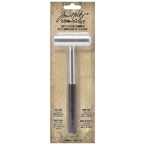 Tim Holtz - Idea-Ology - Texture Hammer. The Tim Holtz Tiny Texture Hammer small size makes it ideal for intricate tasks such as denting metal embellishments and hammering nails into craft projects with precision. Available at Embellish Away located in Bowmanville Ontario Canada.