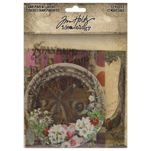 Load image into Gallery viewer, Tim Holtz - Idea-Ology - Transparent Layers - 12/Pkg. The transparent material allows light to pass through, creating a unique and mesmerizing effect, drawing the eye to your artwork. Available at Embellish Away located in Bowmanville Ontario Canada.
