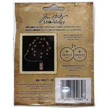 Load image into Gallery viewer, Tim Holtz - Idea-Ology Battery - Operated Wire Light Strands - 2/Pkg - Tiny Lights - Clear (No Batteries). While you need the perfect paper to start your project, you also need the perfect embellishment! Requires two 3V 2032 batteries, not included. Available at Embellish Away located in Bowmanville Ontario Canada.
