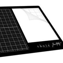 Load image into Gallery viewer, Tim Holtz - Replacement Non-Stick Mat - For Glass Media Mat. A heavy-duty replacement non-stick mat with a heat resistant top surface and non-slip base surface for use with the Tim Holtz Glass Media Mat (sold separately). This package contains one 7.5x11 inch replacement non-stick mat. Imported. Available at Embellish Away located in Bowmanville Ontario Canada.
