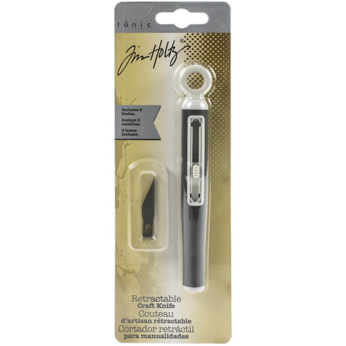 Tim Holtz - Retractable Craft Knife W/3 Blades. Perfect for crafting, rubber stamping and scrapbooking! This package contains one retractable craft knife and two spare blades. WARNING: Sharp edge. Imported. Available at Embellish Away located in Bowmanville Ontario Canada.