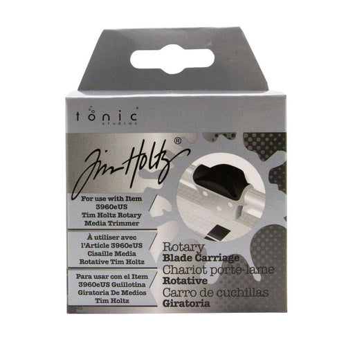 Tim Holtz - Rotary Media Trimmer - Spare Blade Carriage. The Replacement Blade Carriage for the Tim Holtz® Rotary Media Trimmer, the perfect solution for quick and easy blade replacement during your crafting projects. Available at Embellish Away located in Bowmanville Ontario Canada.