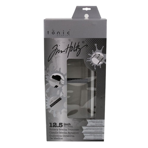 Tim Holtz - Rotary Media Trimmer. Featuring a geared rotary cutting blade, this trimmer effortlessly cuts through a range of crafting mediums. Available at Embellish Away located in Bowmanville Ontario Canada.