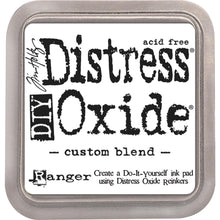 Load image into Gallery viewer, Tim Holtz - Distress Oxide Pad - Large. Create an aged look on papers, fibers, photos and more! This package contains one 2-1/4x2-1/4 inch ink pad. Comes in a variety of distressed colors. Each sold separately. Available at Embellish Away located in Bowmanville Ontario Canada. Custom Blend.
