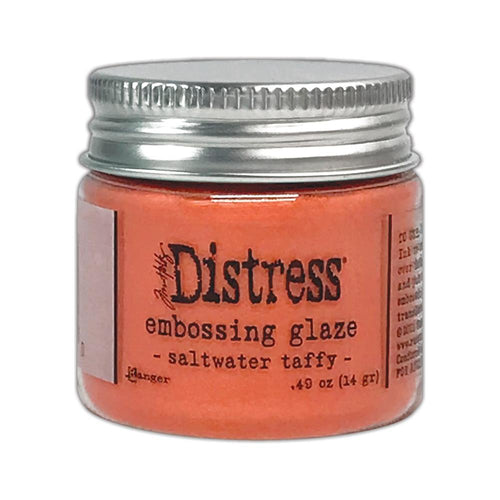 Tim Holtz - Ranger - Distress Embossing Glaze - Saltwater Taffy. Add dimension to your projects with new embossing glaze! These translucent embossing powders are ideal for layering on surfaces. This package contains .49oz of embossing glaze. Comes in a variety of colors. Each sold separately. Made in USA. Available at Embellish Away located in Bowmanville Ontario Canada.