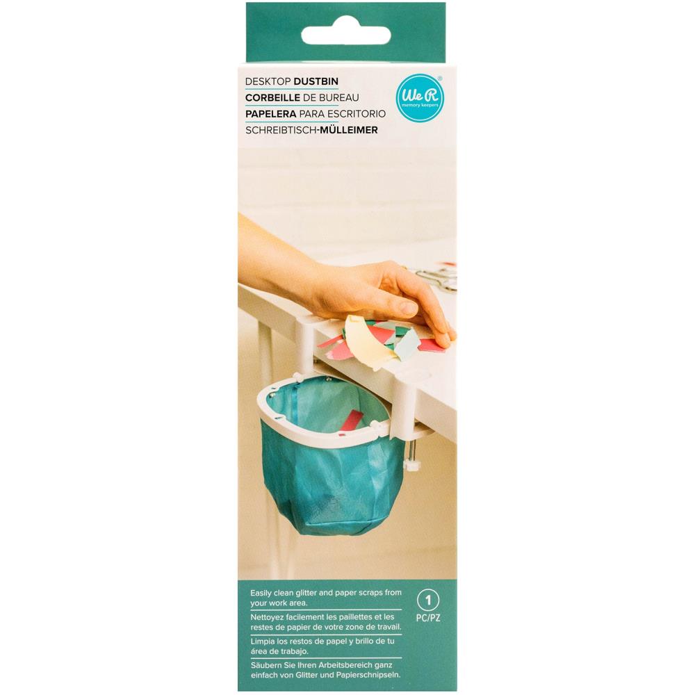 We R Memory Keepers - Desktop Dustbin. Keep your crafting space clean with the Desktop Dustbin from We R Memory Keepers. This handy little litter-catcher is perfect for decluttering after a long day of crafting. The adjustable clamps fit on most desks and work surfaces to accommodate any space, and this makes it easy to scoop and sweep up glitter and paper scraps from your work area. Available at Embellish Away located in Bowmanville Ontario Canada.