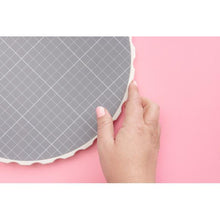 Load image into Gallery viewer, We R Memory Keepers - Rotating Platform &amp; Cutting Mat 10&quot;. Work on your projects from every angle with the Rotating Cutting Mat. This unique cutting mat features a removable, replaceable, self-healing mat that you can turn instead of your projects. Available at Embellish Away located in Bowmanville Ontario Canada.

