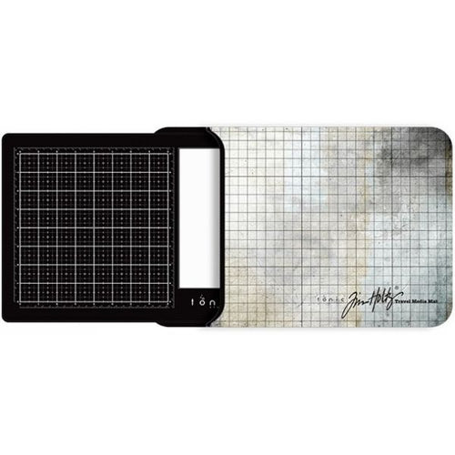 Start your creative journey with the Tim Holtz Travel Glass Media Mat. Whether making on the move or maximizing your workspace, the Tim Holtz Travel Media Mat is the perfect multi functional tool to begin your creative journey. Available at Embellish Away located in Bowmanville Ontario Canada.